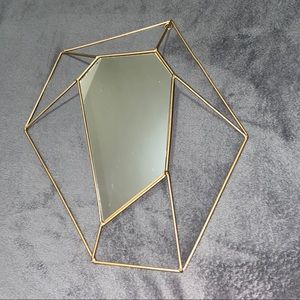Asymmetrical wall mirror